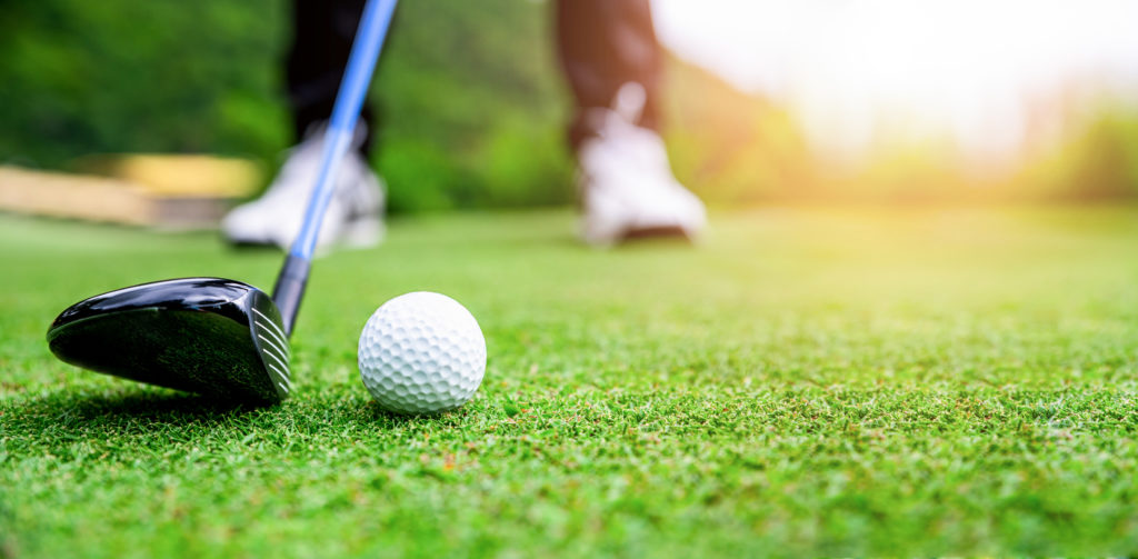 Golfer Teeing off