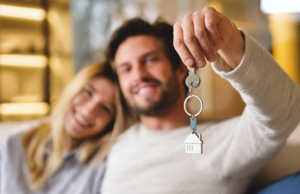 4 Steps For First-Time Home Buyers couple buying their first home