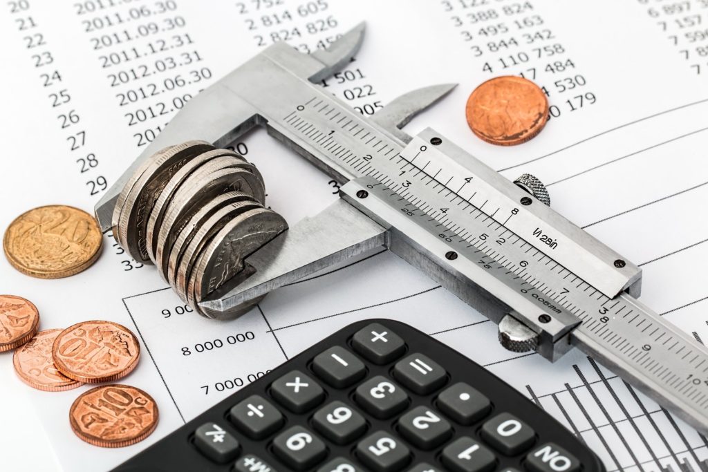 calculator and money on desk