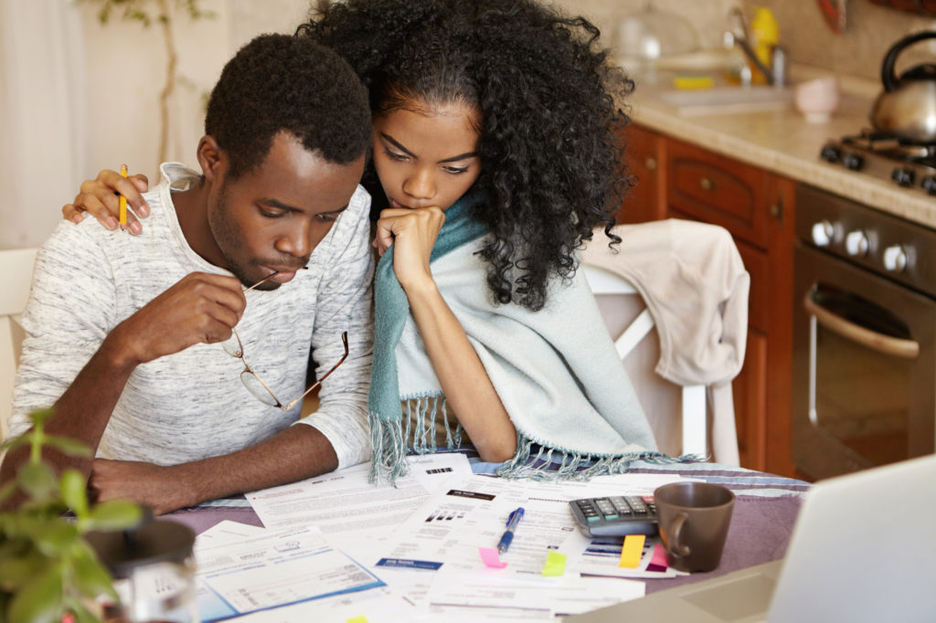 couple looking over their bills